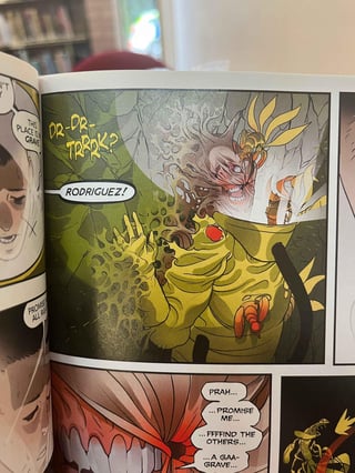 Photograph of comic book page showing someone mid-transformation begging to be killed