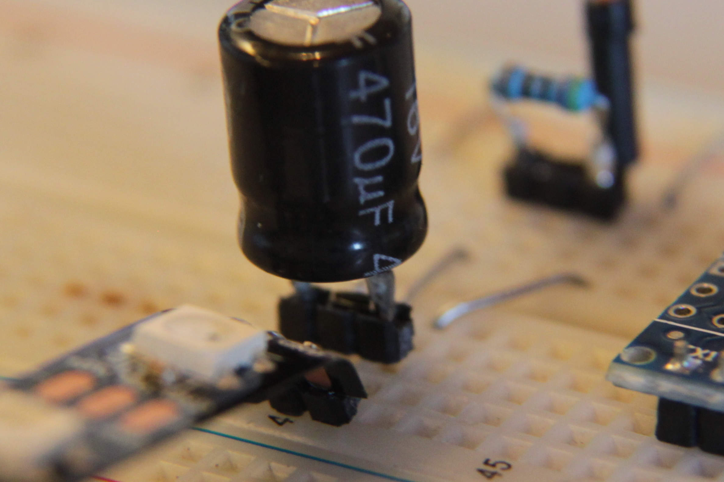 The 470µF capacitor between Ground and +5 V