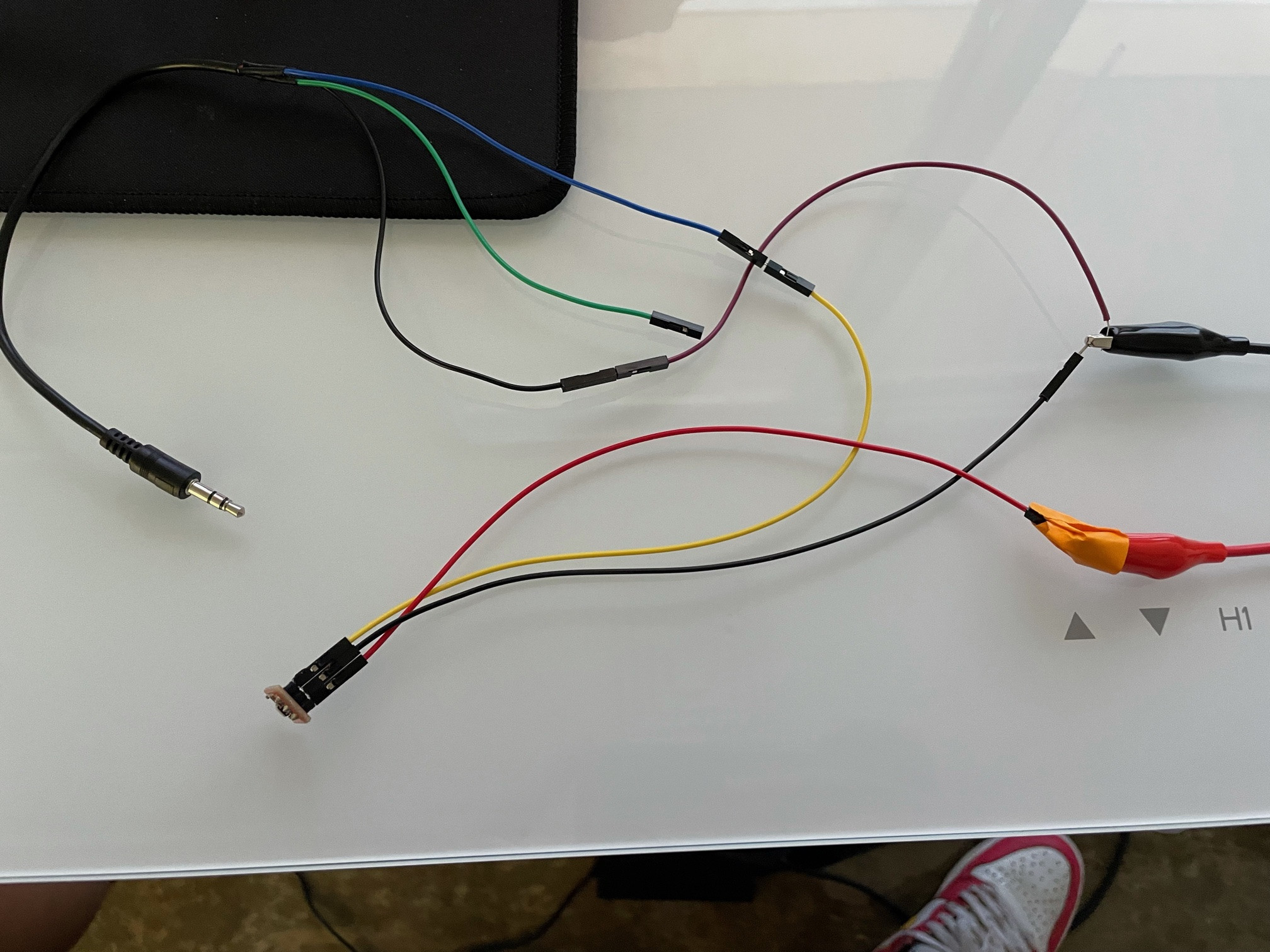 A cut-up and spliced audio jack hooked up to the MEMS breakout and a PSU