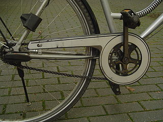 http://upload.wikimedia.org/wikipedia/commons/thumb/6/69/Bike_chain_guard_part.JPG/320px-Bike_chain_guard_part.JPG