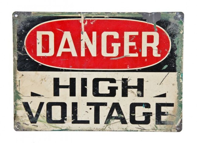 A danger high-voltage sign, in red