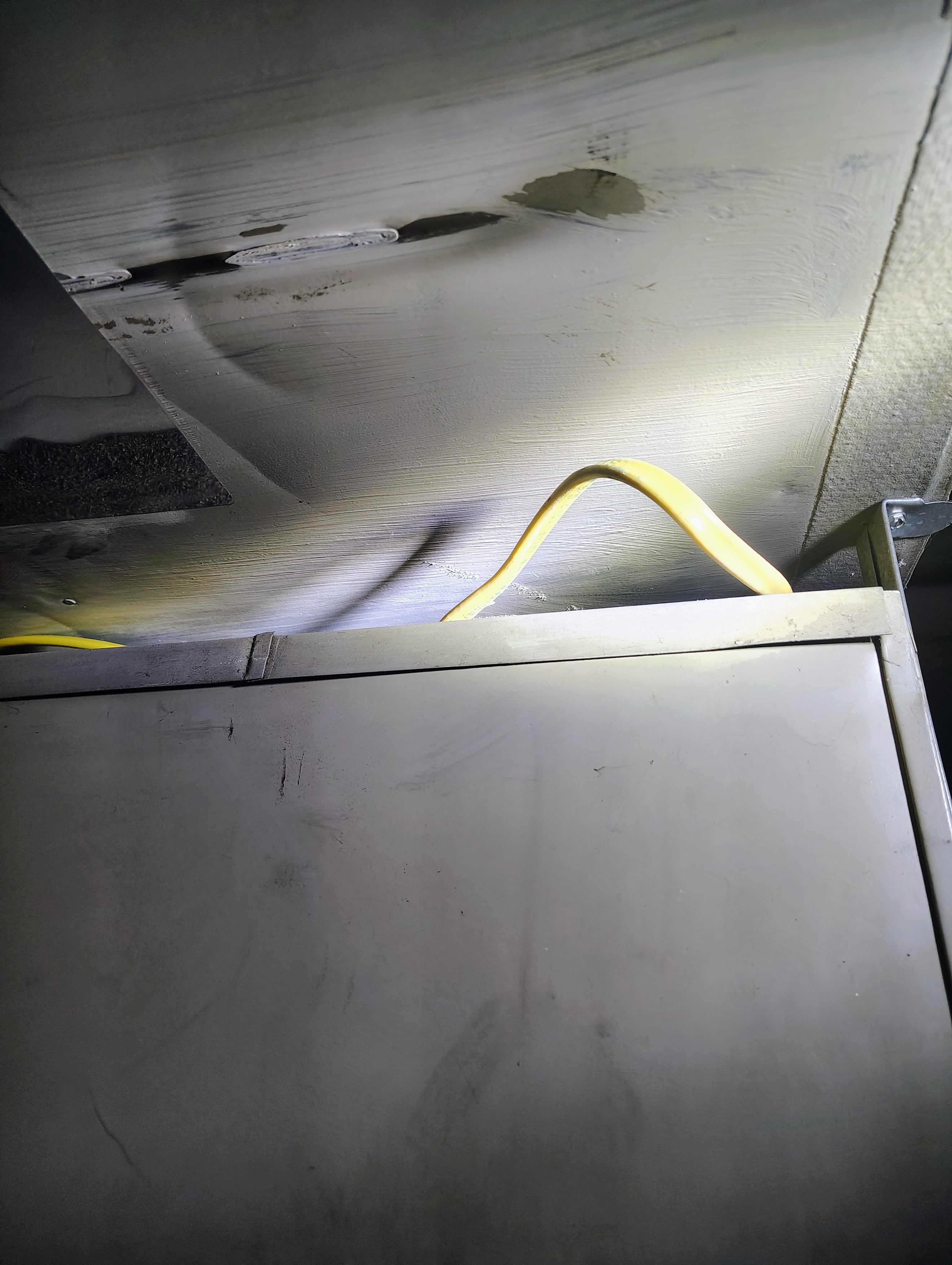 Romex on top of furnace duct