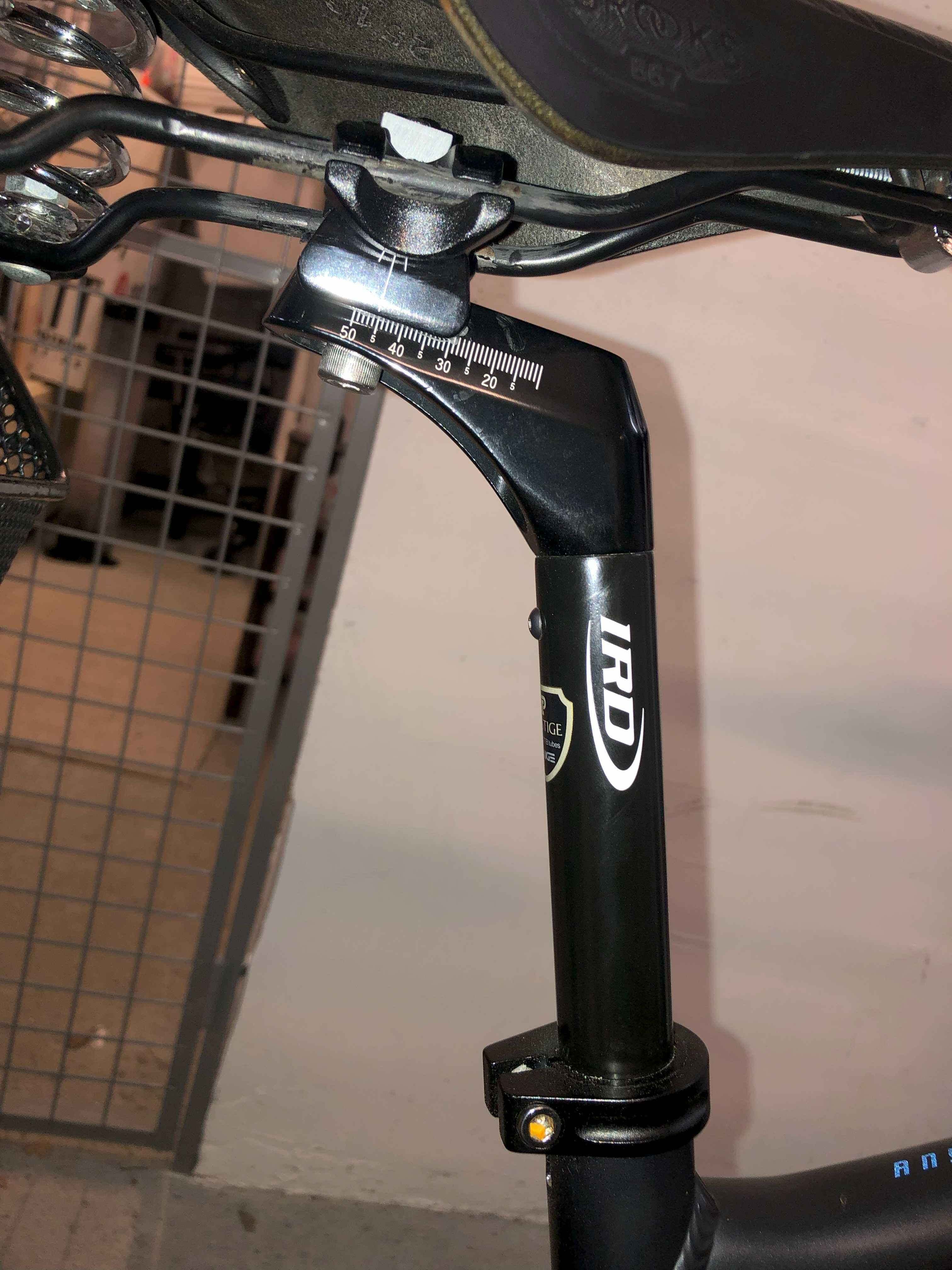 Photograph of the seatpost from underside.