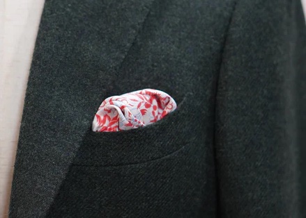 Image of a discreet pocket square  in a men's breast pocket