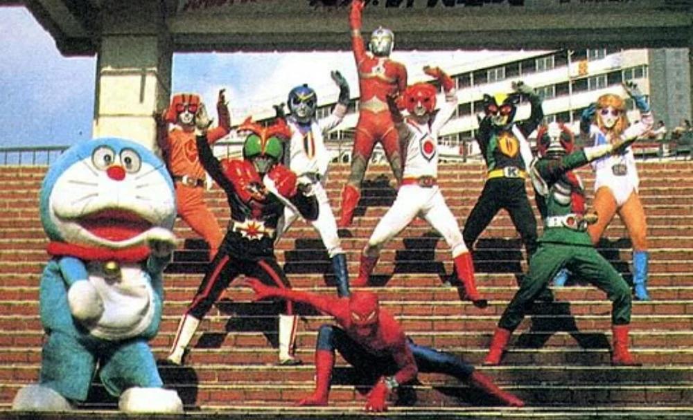 Promotional image showing Battle Fever J, "Japanese Spiderman", Ultraman Joneus, Doraemon, and Kamen Rider Harder posing together