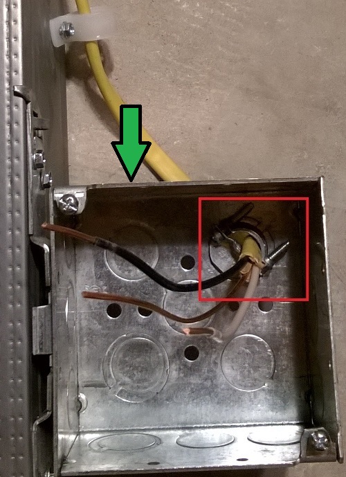 NM cable clamp screws inside box -- seen from outside box