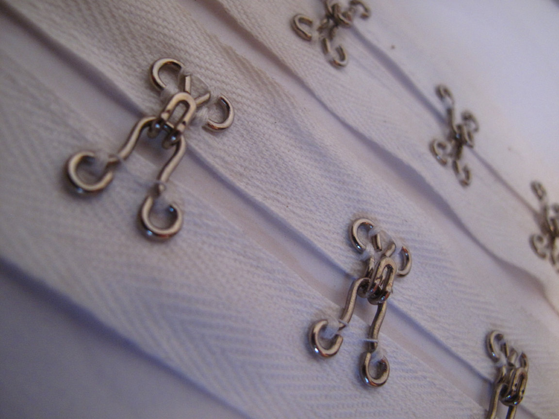 Hook and eye fasteners on fabric