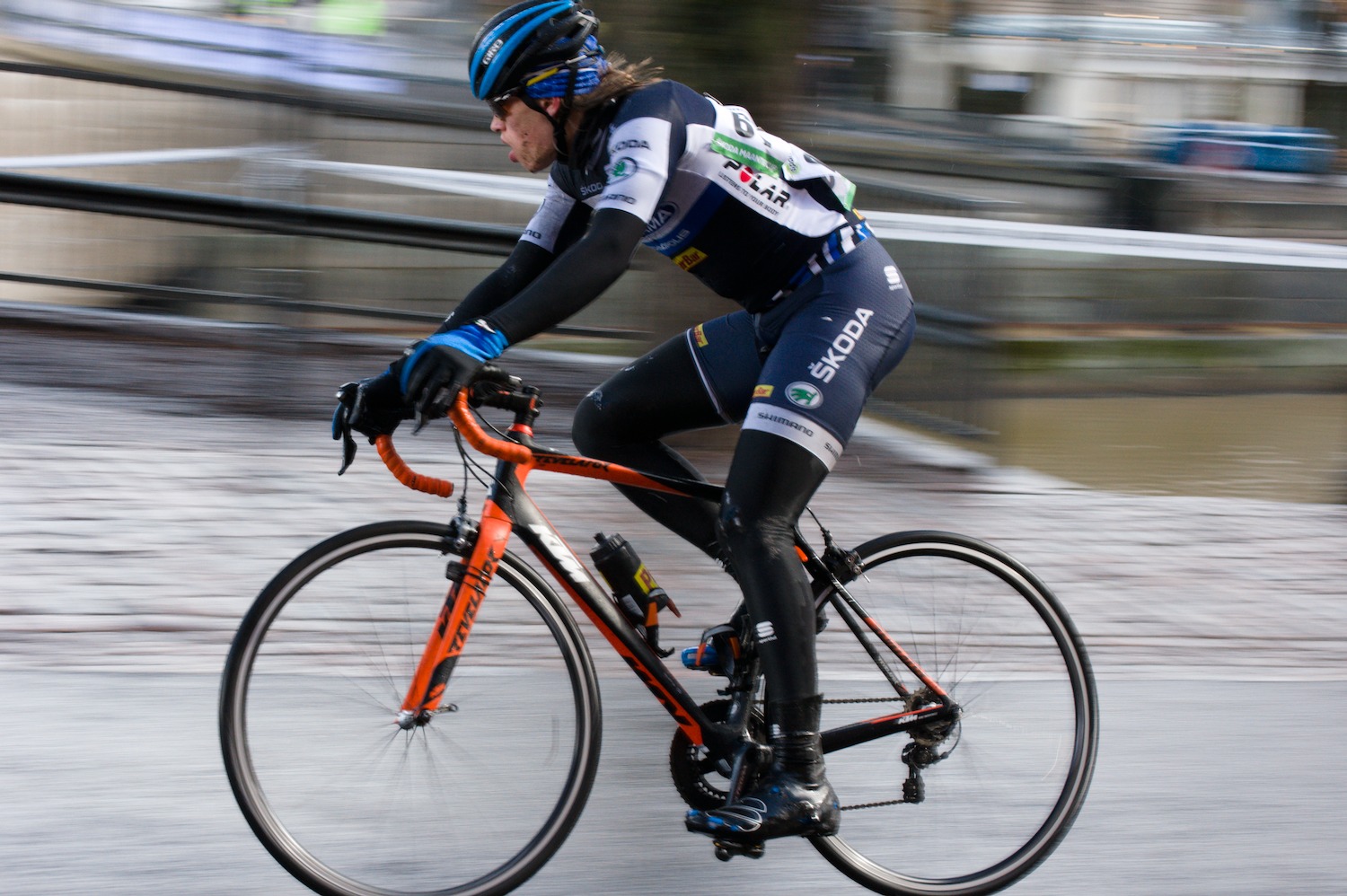 Mid shutter speed cyclist pan