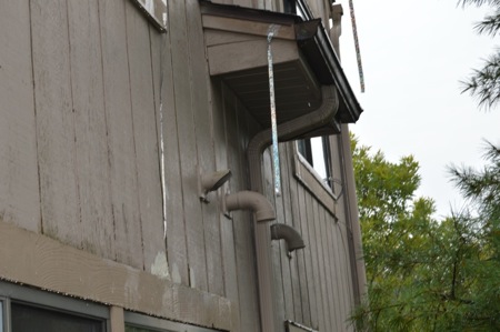 back of wall with pipes, mine on left