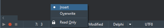 Delphi IDE status bar menu showing Insert/Overwrite mode