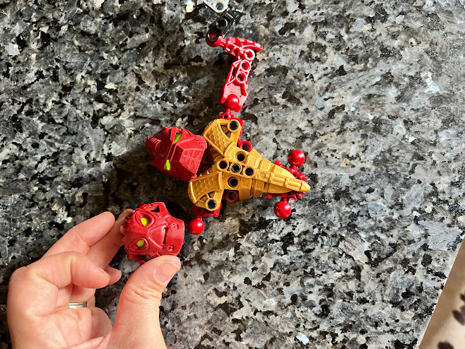 disassembled red+gold bionicle