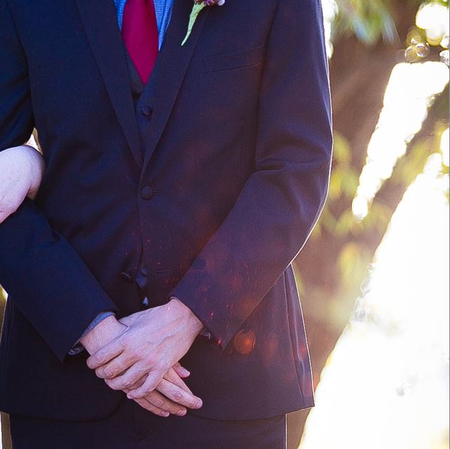 Red blotches on suit