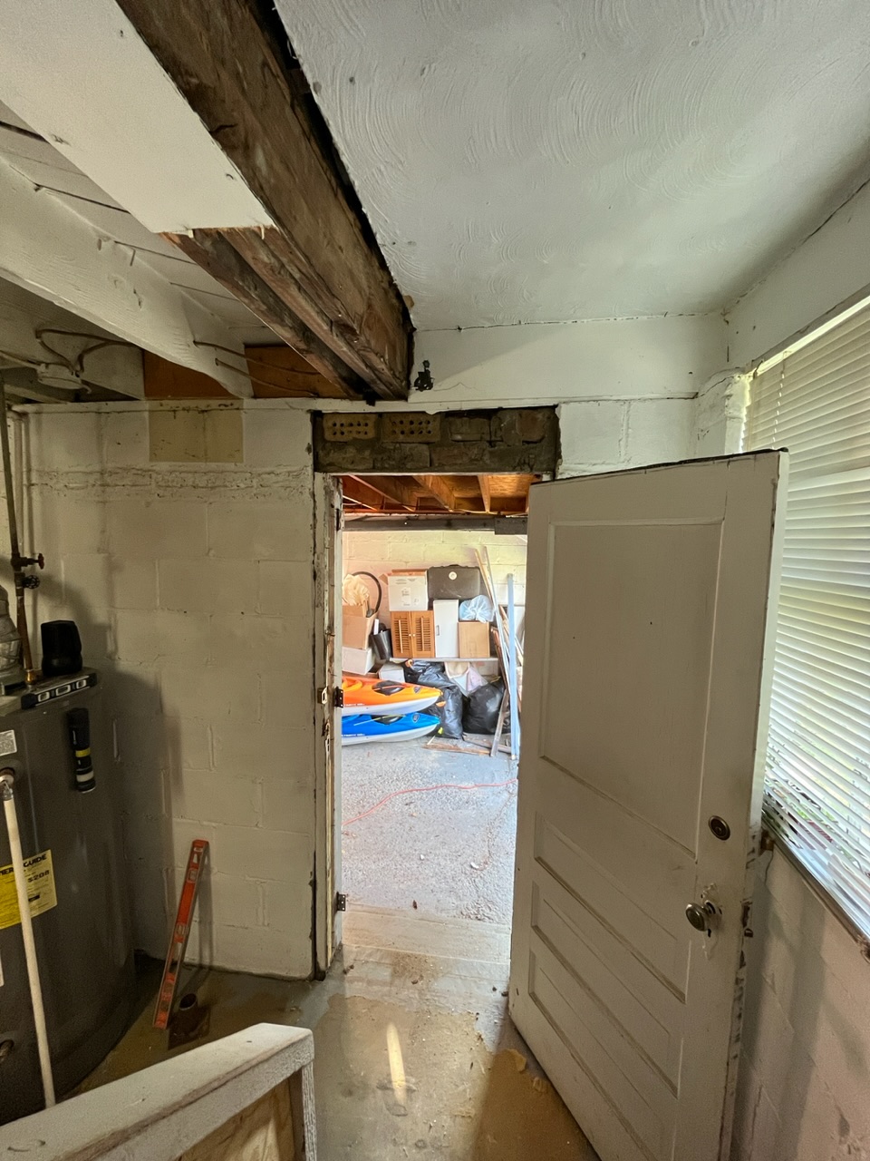 Door opening from basement to garage