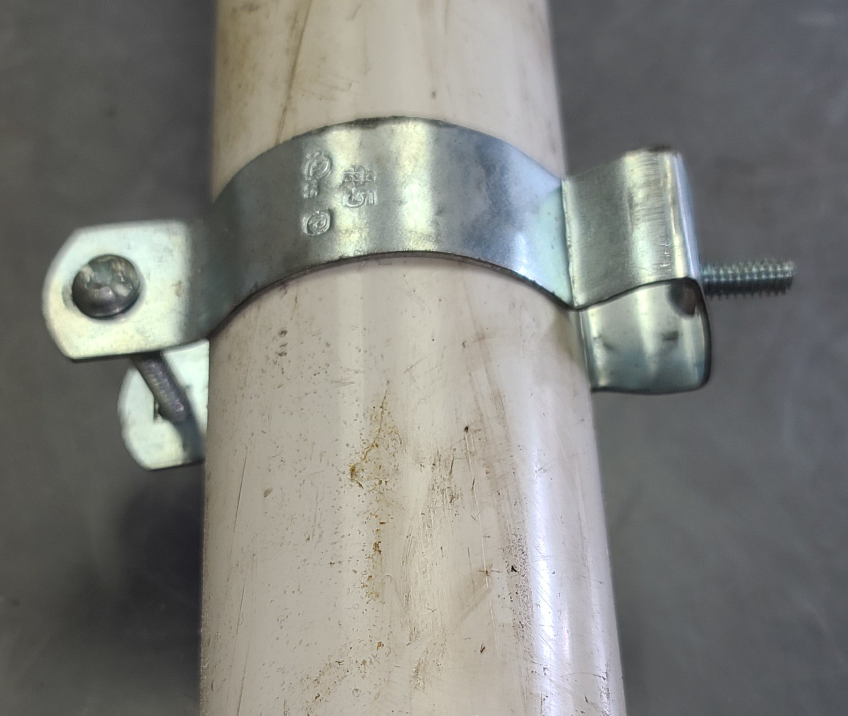 conduit hanger on pipe. 