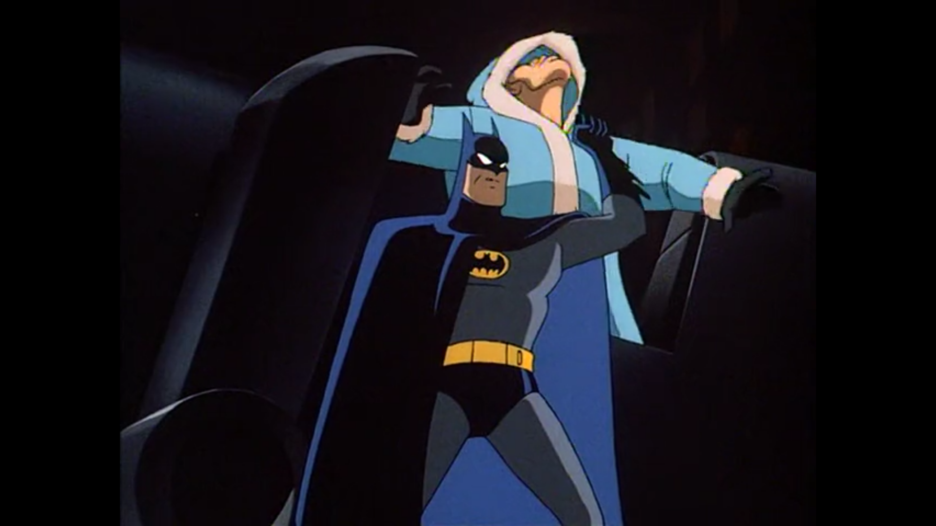 The aforementioned scene. Batman performs a offhand backhand punch using his left hand to knock out a henchman who tried to surprise him from behind.