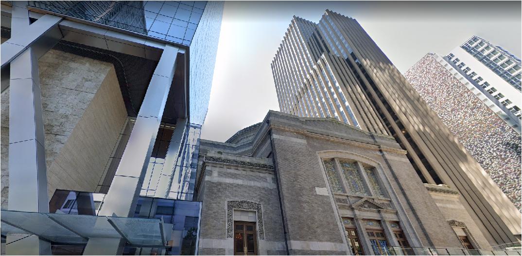 The F5 Tower from the opposite angle, showcasing its placement next to the Sanctuary building and a few other, distinctly different skyscrapers.