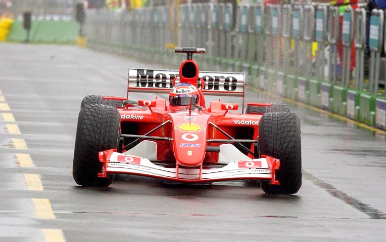 image of a Ferrari F1 car displaying negative camber