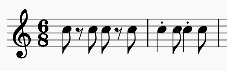 two measures, one with eighth notes and rests, one with staccato quarter notes