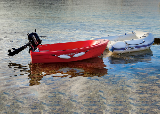 a typical dinghy on the left 