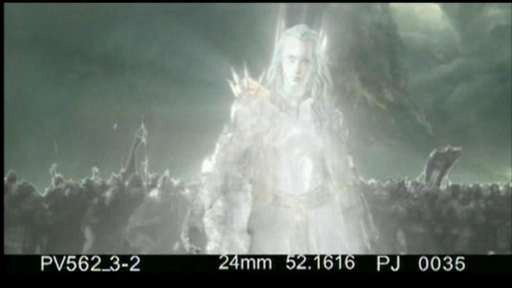 Comp of Sauron, as a helmetless Anatar, in spiky but silver plate standing in mystical luminance before his forces