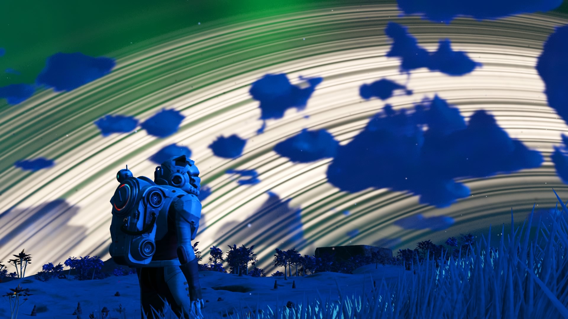 Admiring the horizon of a ringed planet in No Man's Sky