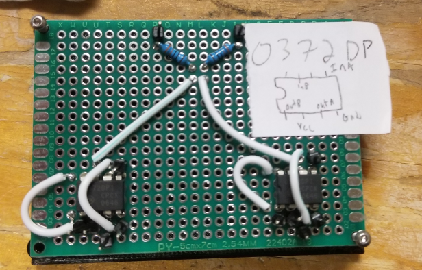 example of nonfunctional noninverting circuit.  Input and output pins are not connected - they follow the schematic, with the addition of 3.3V and 0V at the top to serve as a voltage divider.  In_A and In_B correspond to noninverting inputs, inverting inputs are not labelled but are next to them (and wired directly to output)