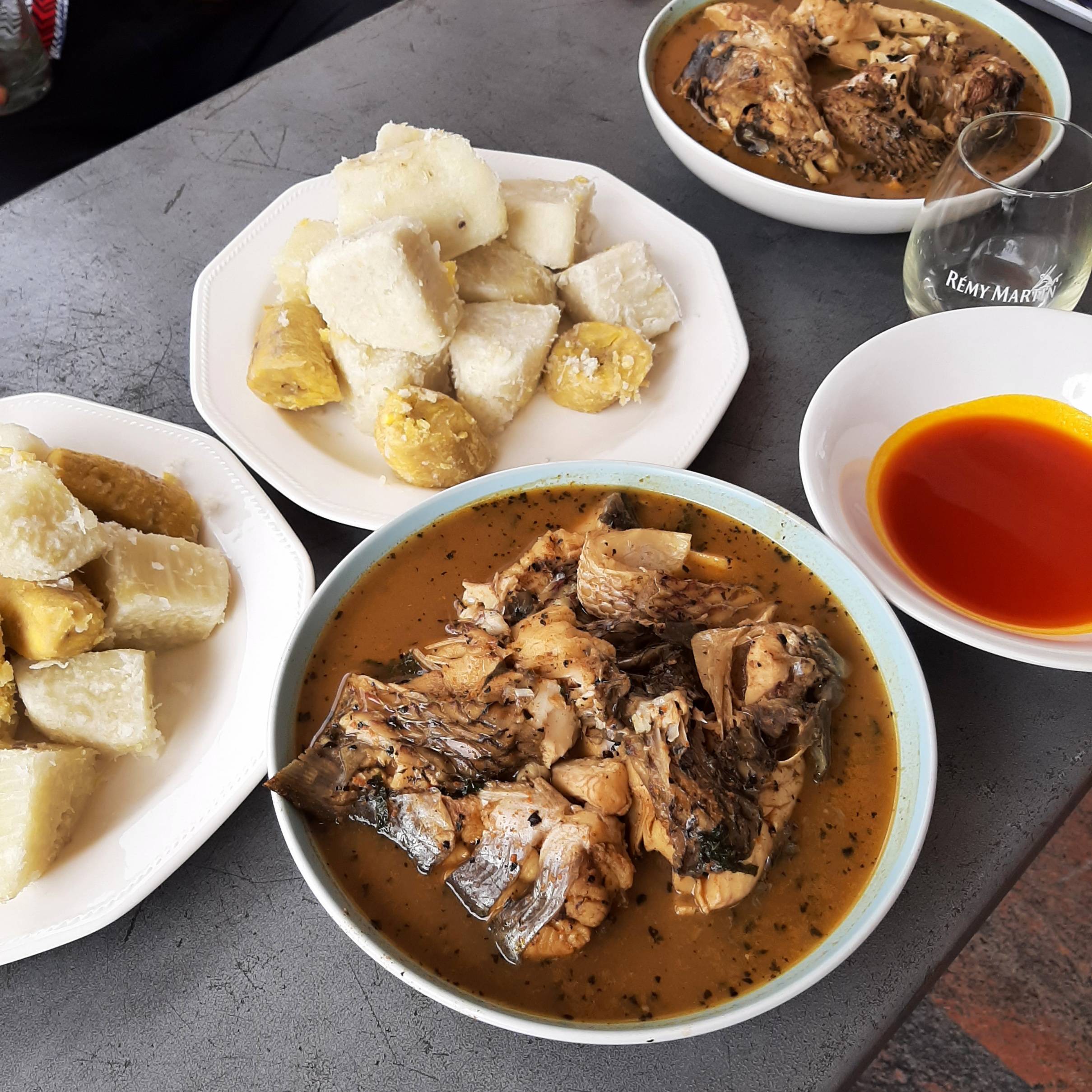 spicy fish soup, boiled yam and plantain, palm oil