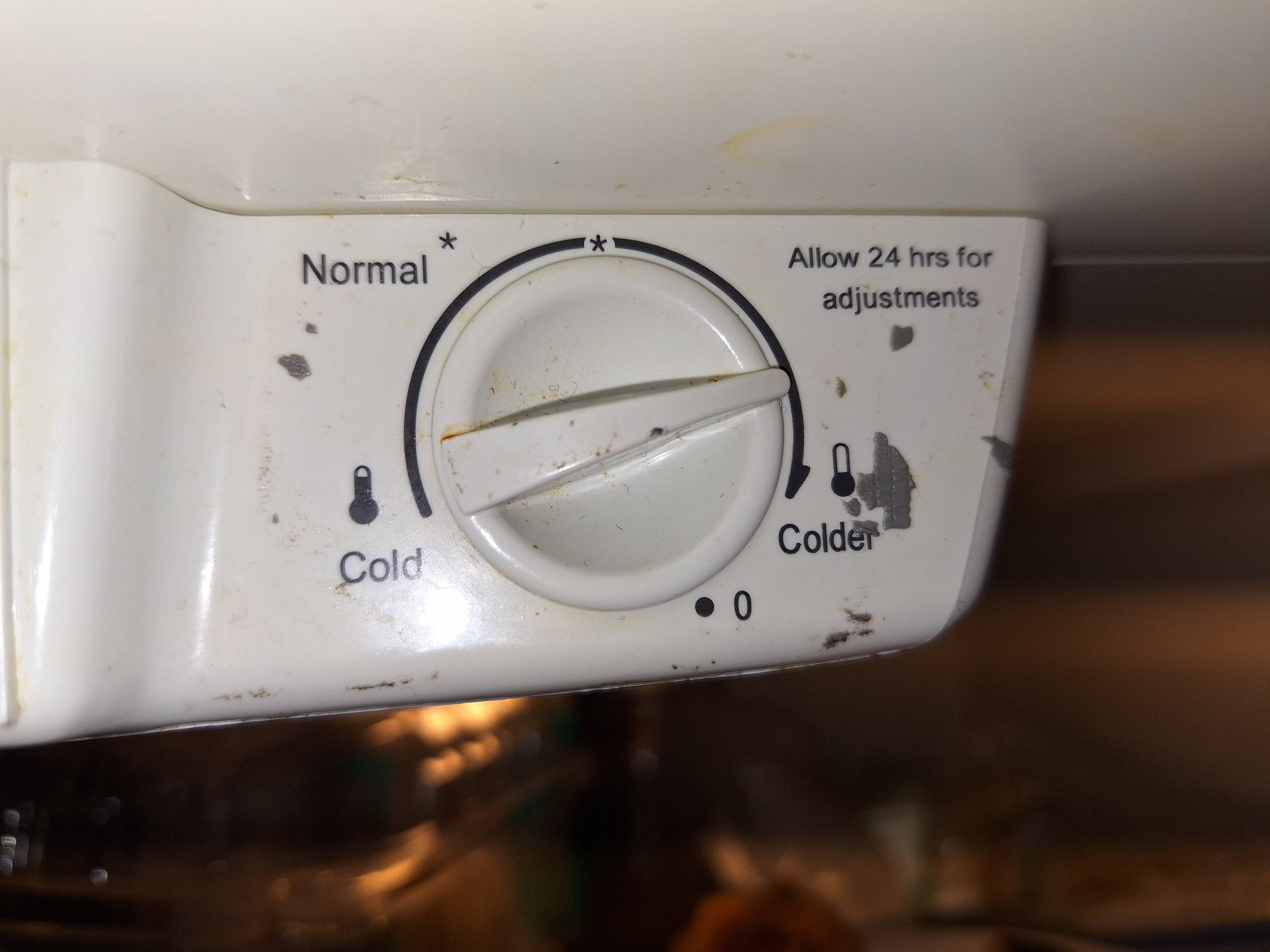 a photograph of a rotary temperature adjustment mechanism for a kenmore brand refrigerator sold in North America prior the the year 2020 and after the year 1960