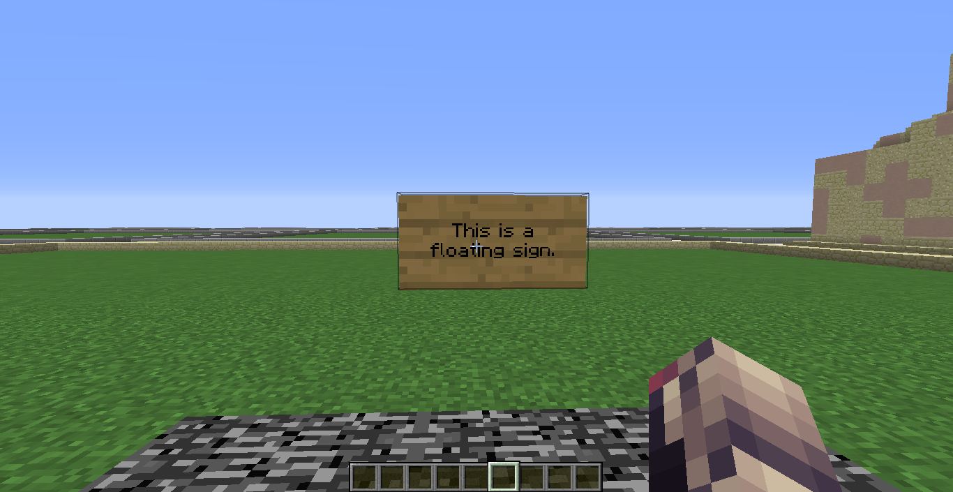 A sign on a barrier block (hidden)