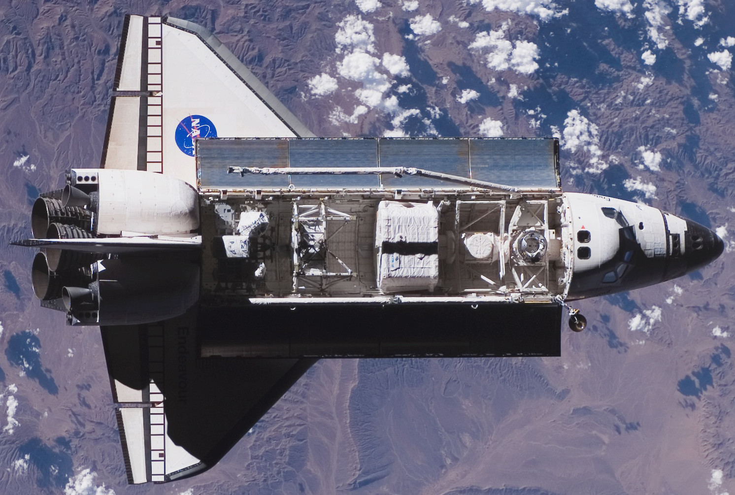 The Space Shuttle Endeavour approaching the ISS during STS-118 on August 10, 2007