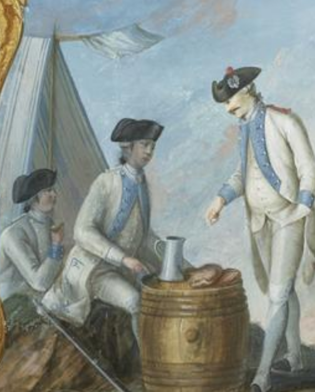 three 18th century soldiers in white uniforms with blue trim use a barrel for a table for their meal and drink