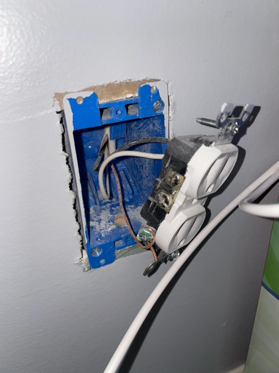 photo of the wires inside of the outlet