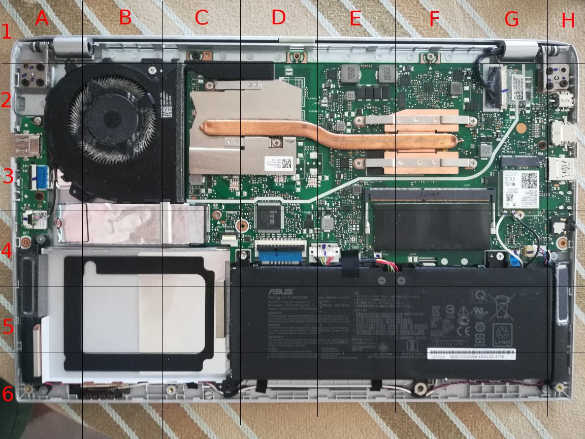 ASUS Vivobook 14 laptop interior - motherboard and battery - grid as overlay