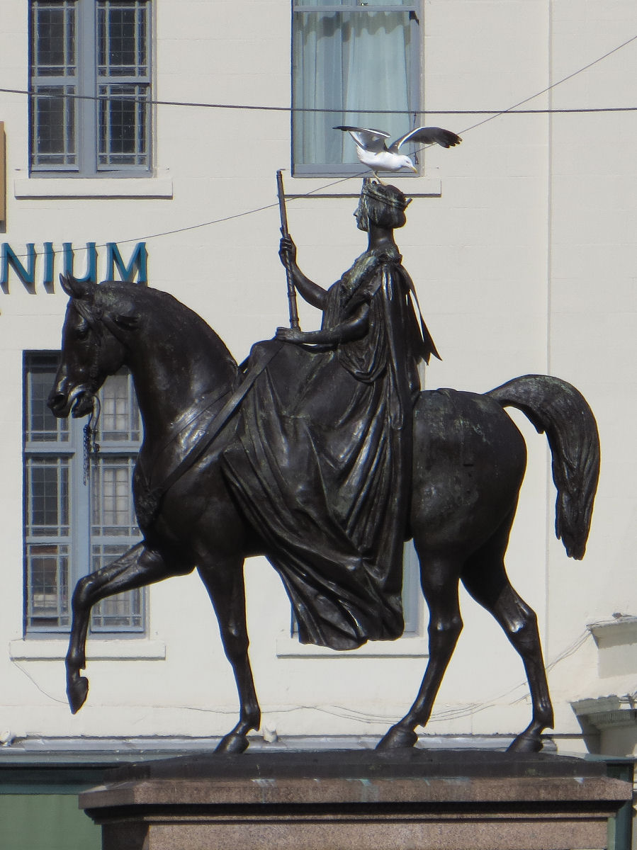 statue with gull on top