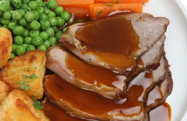 image: Sunday roast meal with gravy