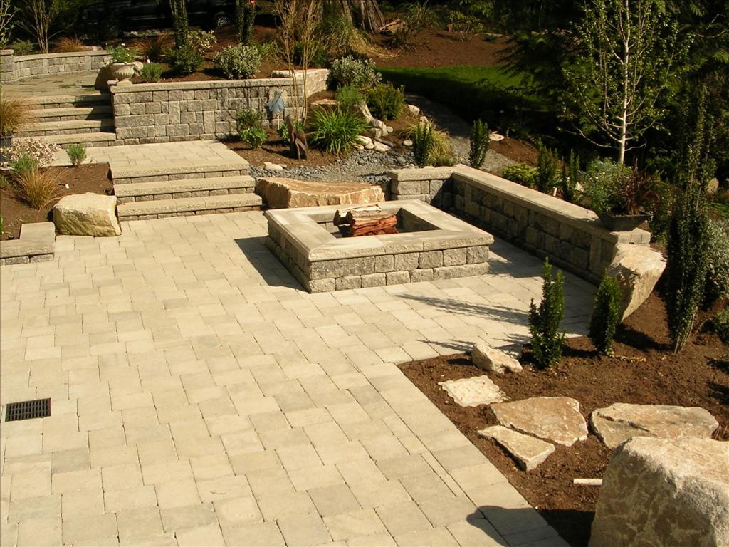 cmu pavers and walls and firepit and water feature