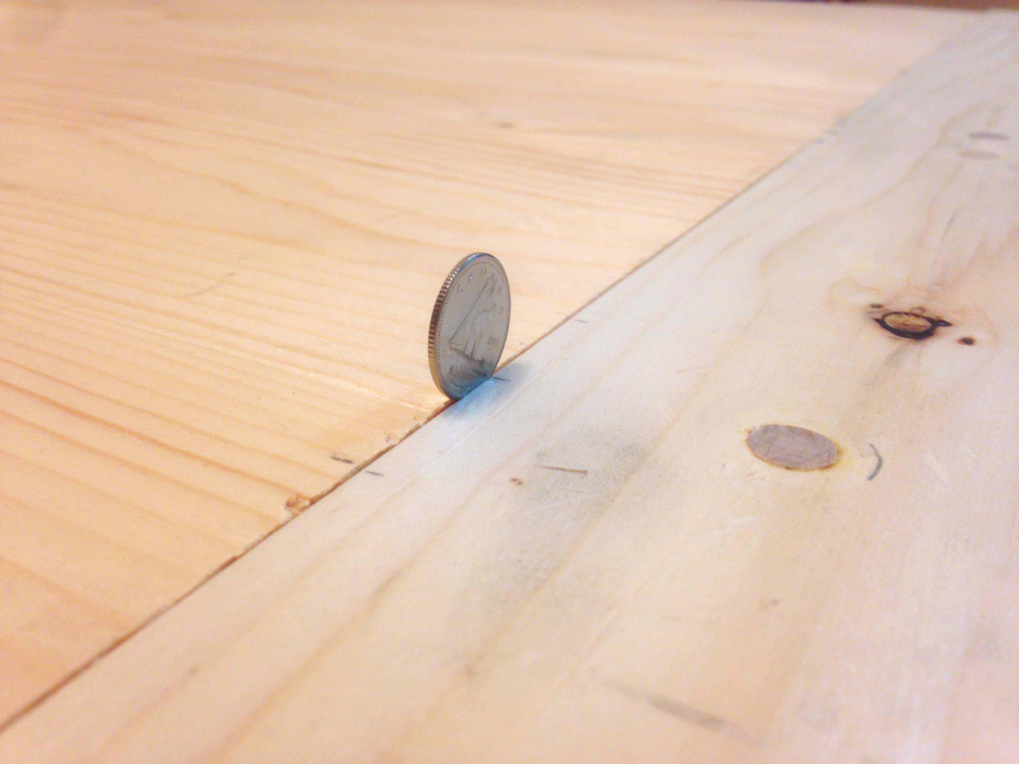 the gap in the table top (not scraped, not sanded)