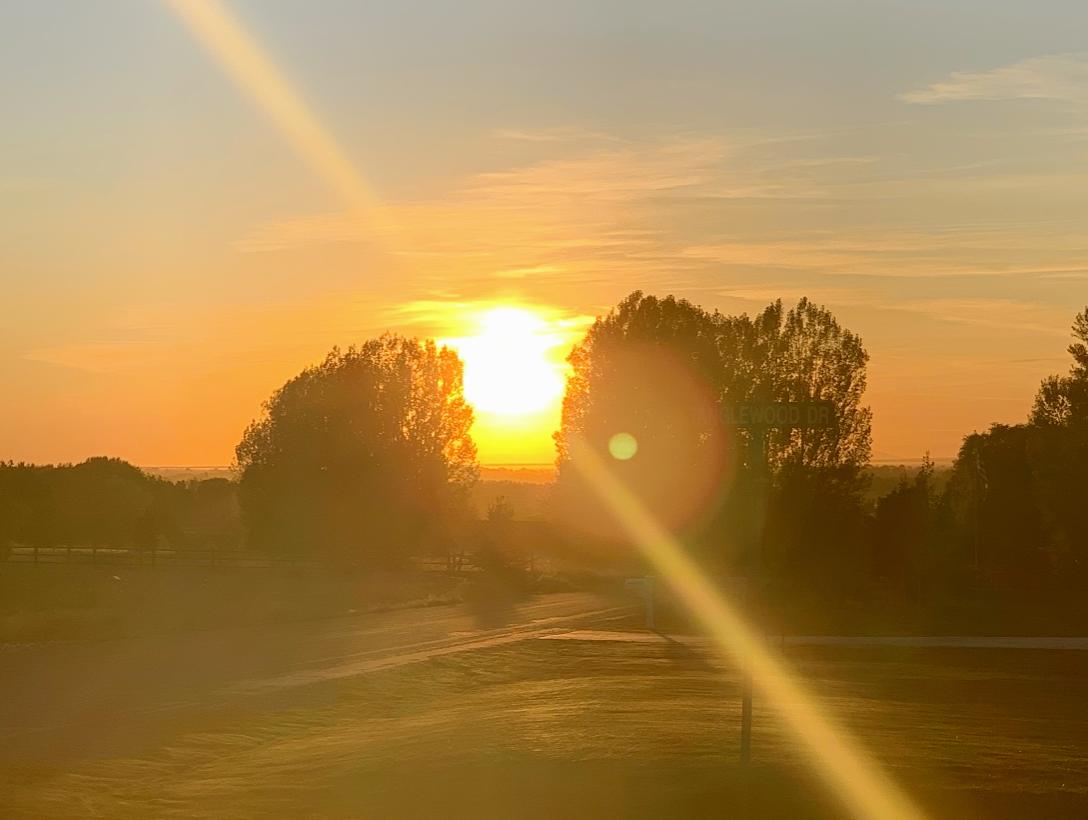 Sunset with lens flare and lens streak