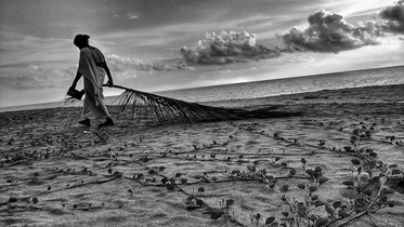 Way back home along the beach - kiran