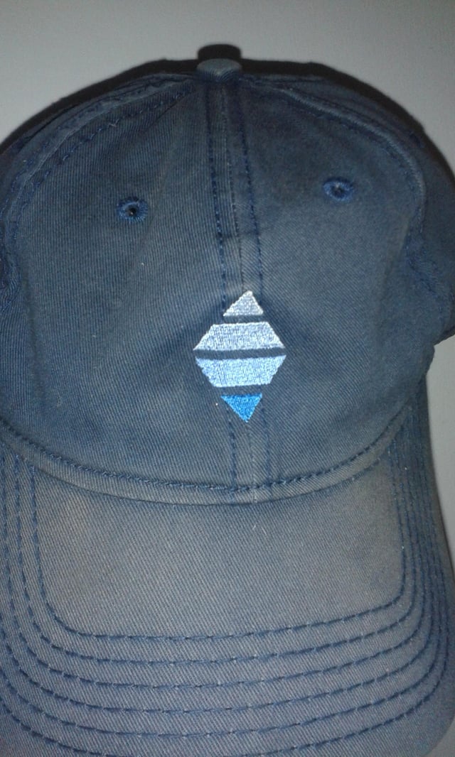 blue cap with SE diamond shaped logo on front