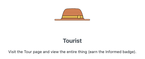 Long description for the Tourist hat reads "Visit the Tour page and view the entire thing (earn the Informed badge)."