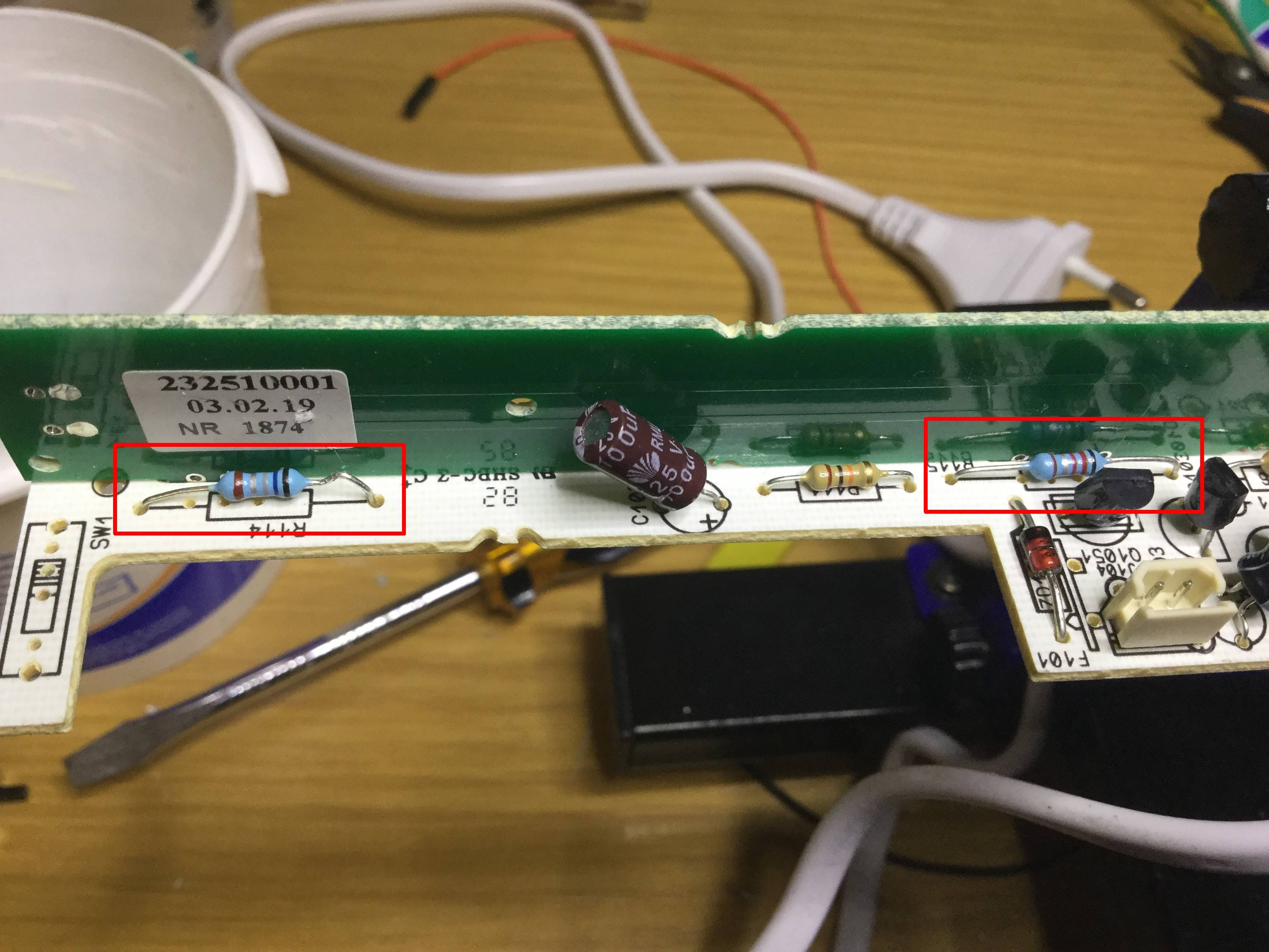 Photo of PCB with two resistors highlighted