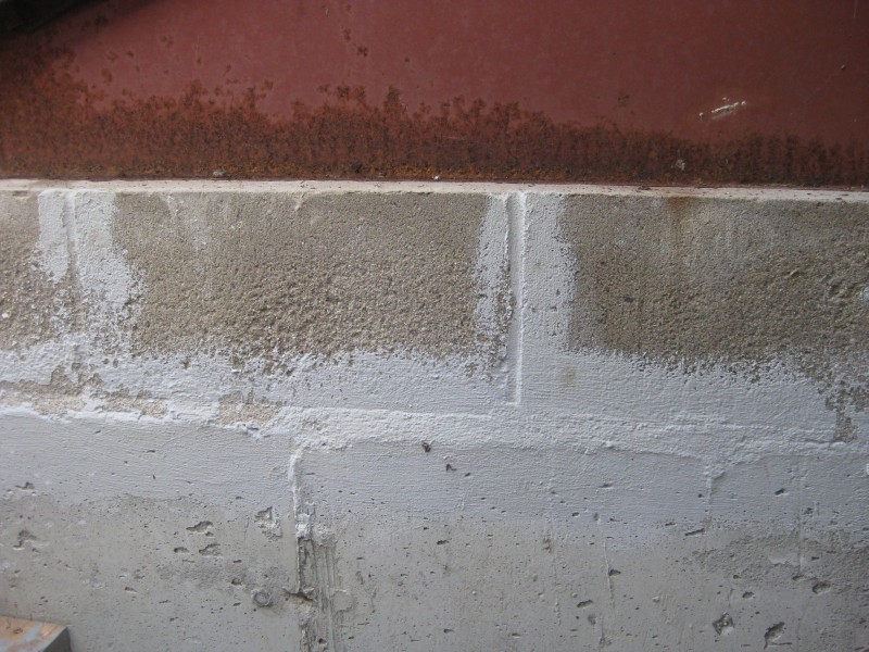 bricks attached to wall and not leaking