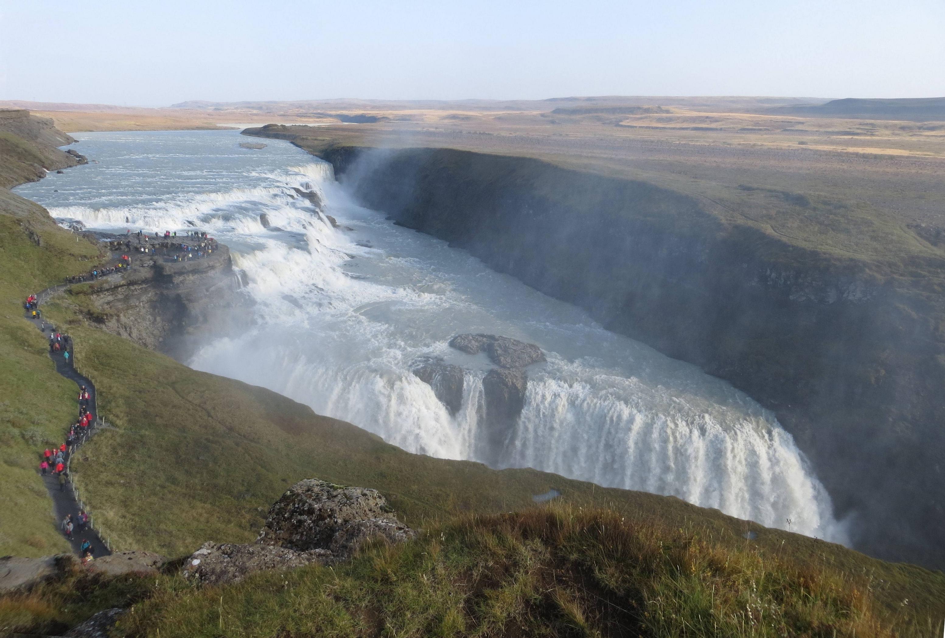 river going into a waterfall, seen from above