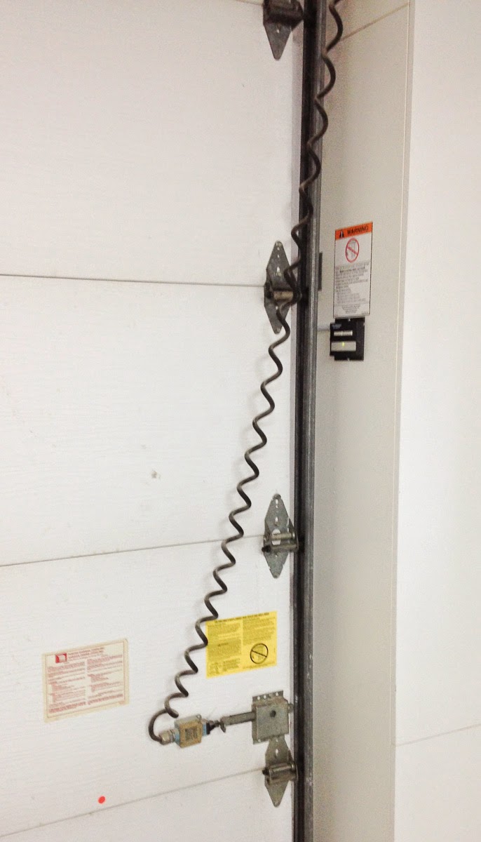 curly cord on garage door