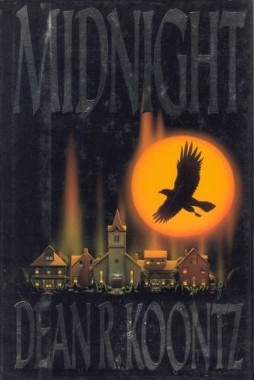 Cover of "Midnight" by Dean Koontz. A bird of prey is silhouetted against an orange light, while in the midground residential houses are illuminated against a dark background.