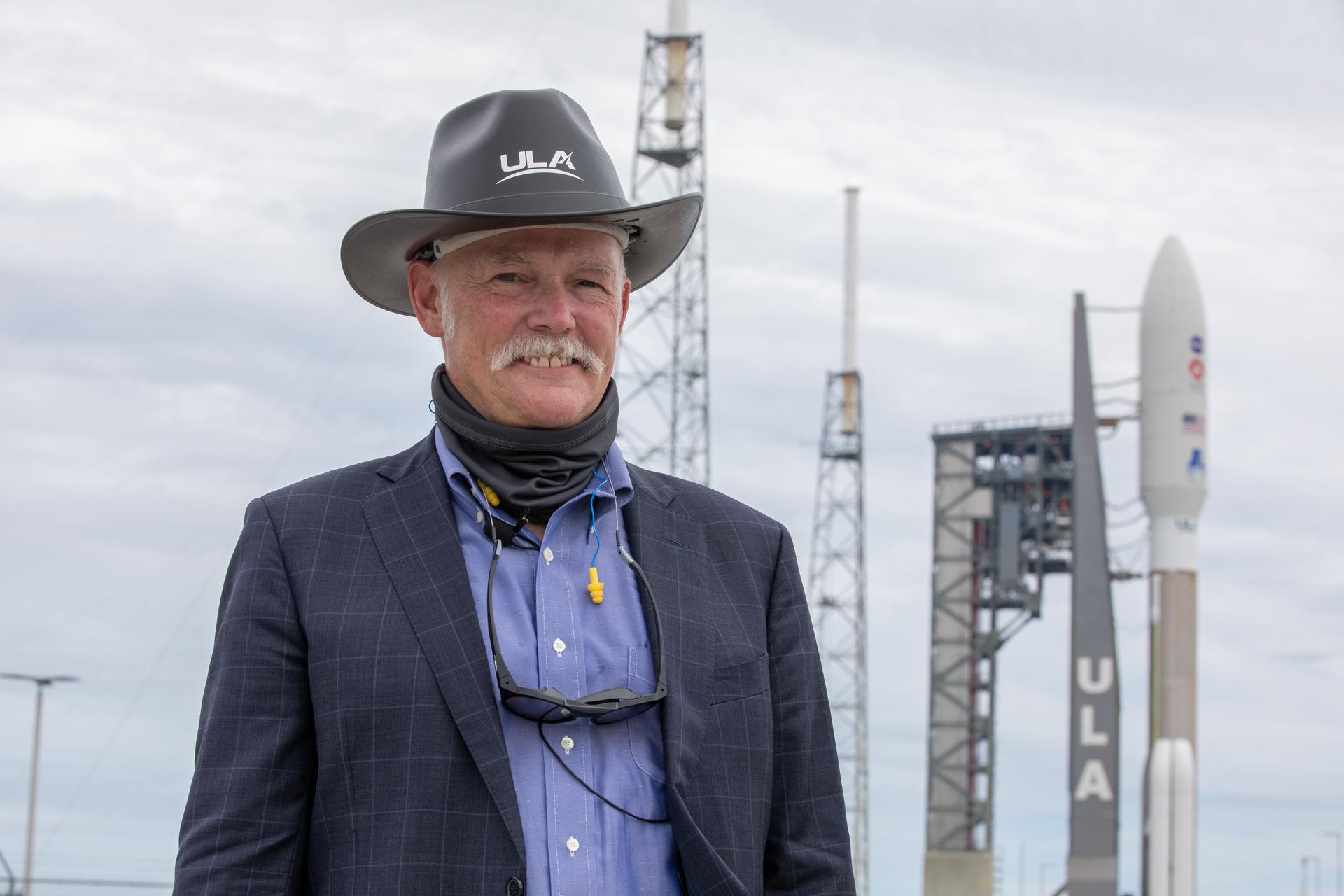 Tory Bruno, president and CEO of United Launch Alliance, poses with the Atlas 5 rocket that will launch NASA’s Mars 2020 Perseverance rover. Credit: NASA/Ben Smegelsky