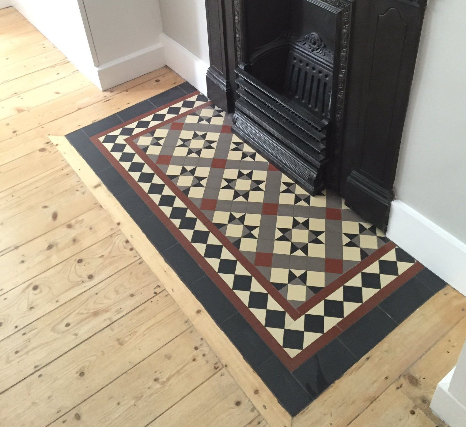 Mosaic tiles on hearth