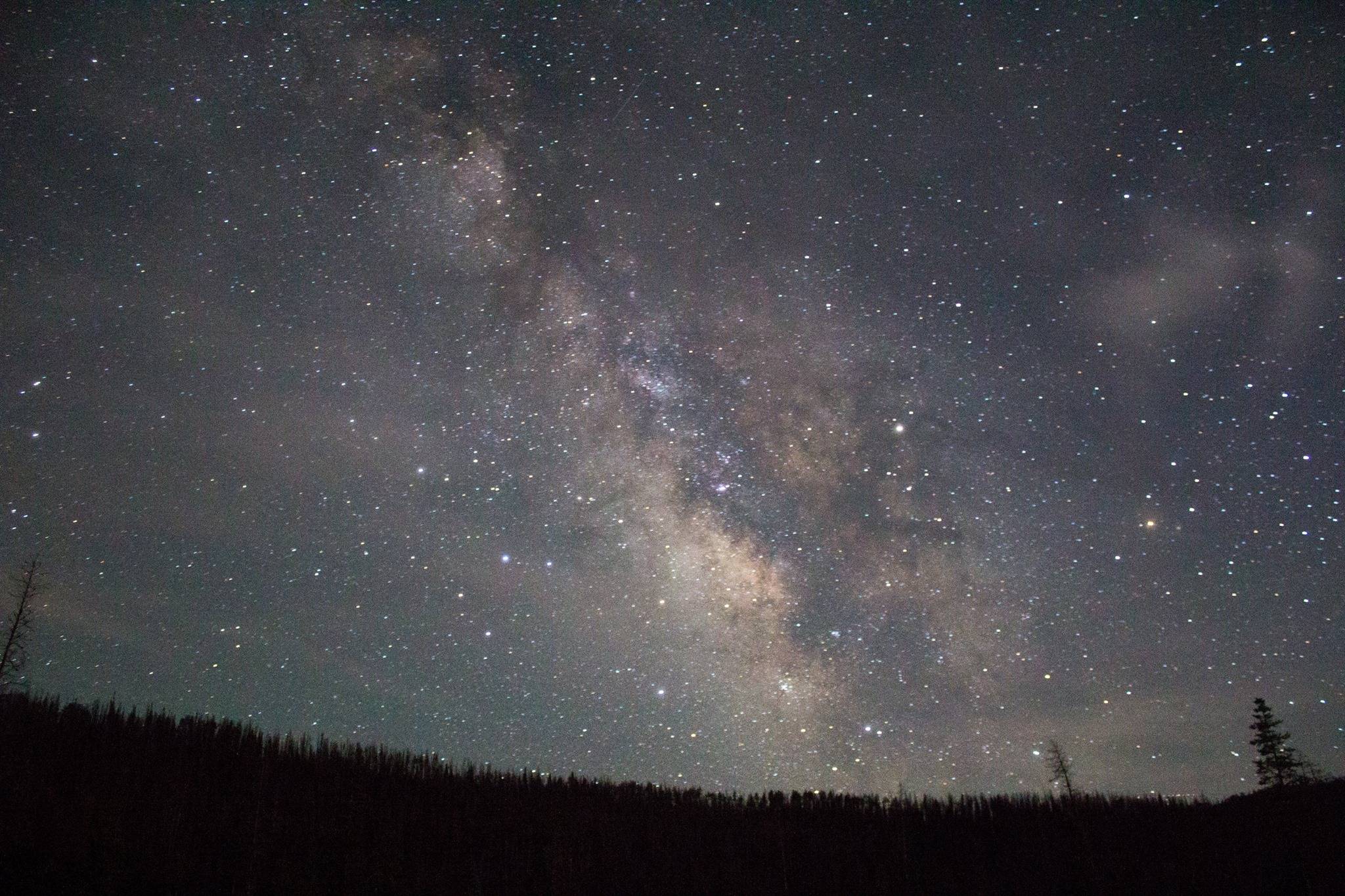 Shot with a Canon T3i, north-east of Steamboat Springs, CO.  I was using 3200 ISO, 30 second exposure, and 2.8 aperture.  This photo was enhanced in Lightroom.