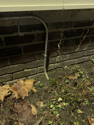 conduit on the side of the house